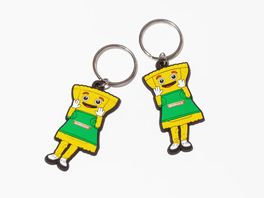 Zwei bunte Schlüsselanhänger mit BÜRGER-Maskottchen in Maultaschenform auf weißem Hintergrund.